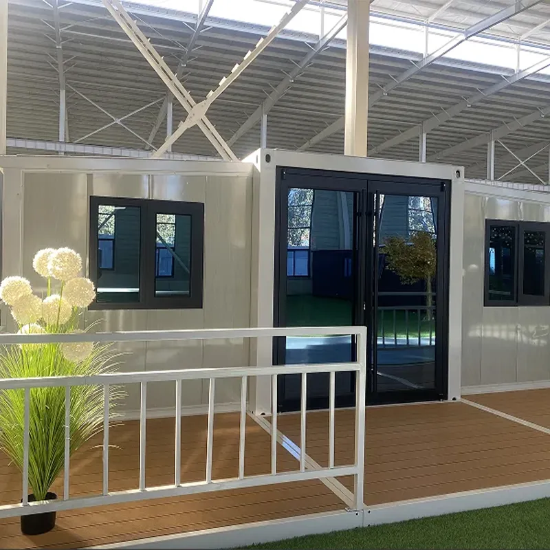 Double winged expandable container house