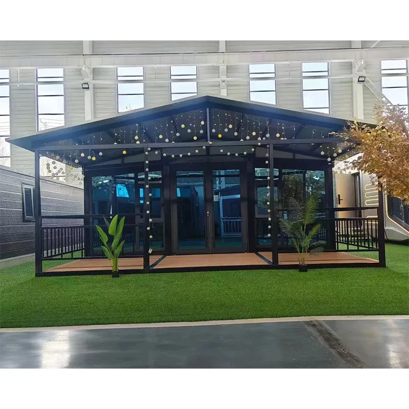 Double winged expandable container house