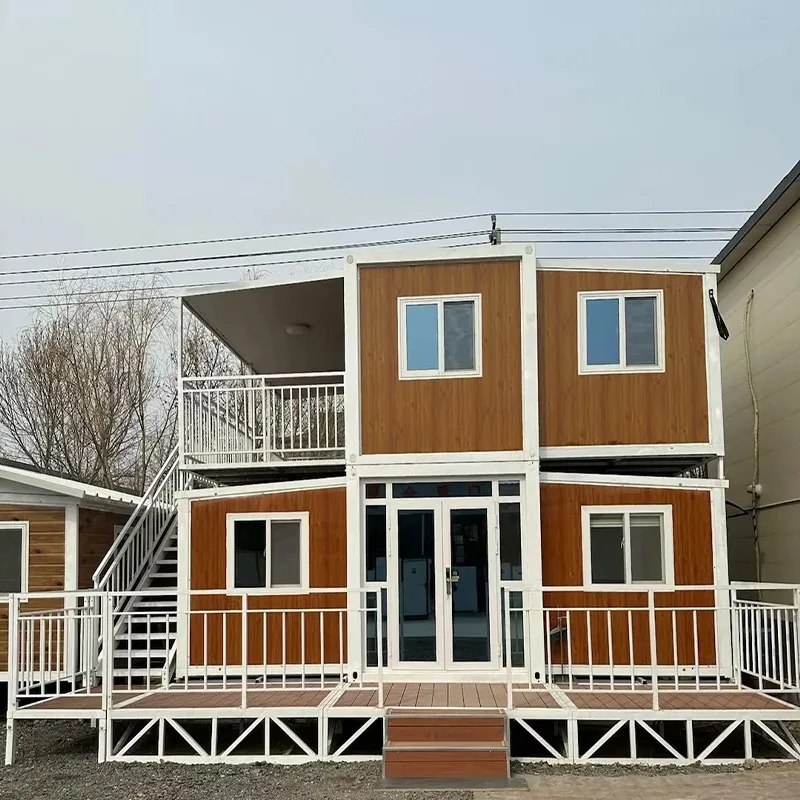 Double winged expandable container house